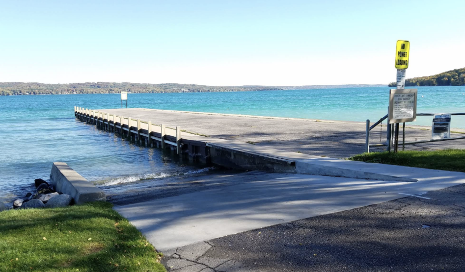 Paved ramp and courtesy dock at Torch Lake Township Boat Ramp